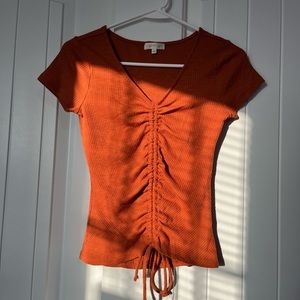 Women’s string orange tee